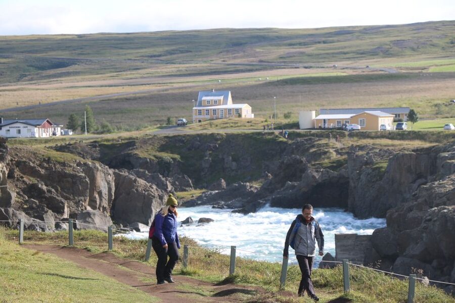 Akureyri: Day Trip to Goðafoss, Lake Mývatn & Nature Baths - Guides, transport, and the human side of the day