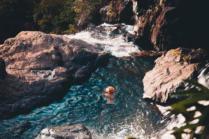 All-Inclusive Waterfall Explorer Day Trip from Airlie Beach - Air-conditioned transport and guide-led commentary