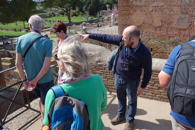 Ancient Ostia Antica Semi-Private Day Trip from Rome by Train with Guide - The Baths Of Neptune And Their Four-Horse Mosaic