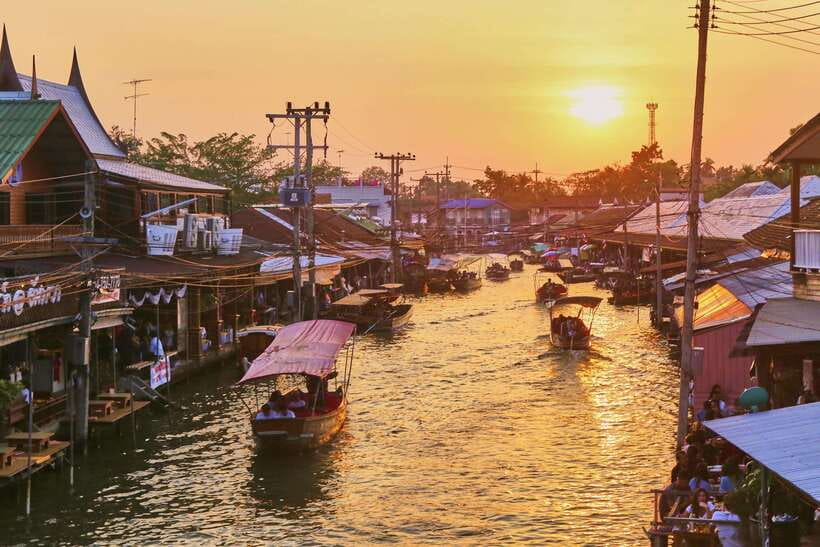Bangkok: Maeklong Railway & Amphawa Floating Market Day Trip - The train passing through Maeklong Railway Market