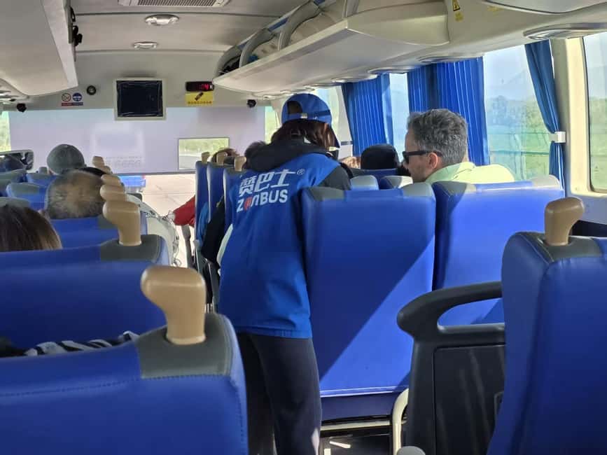 Beijing: Mutianyu Great Wall Day Trip by Bus with Tickets - The return bus and evening plans