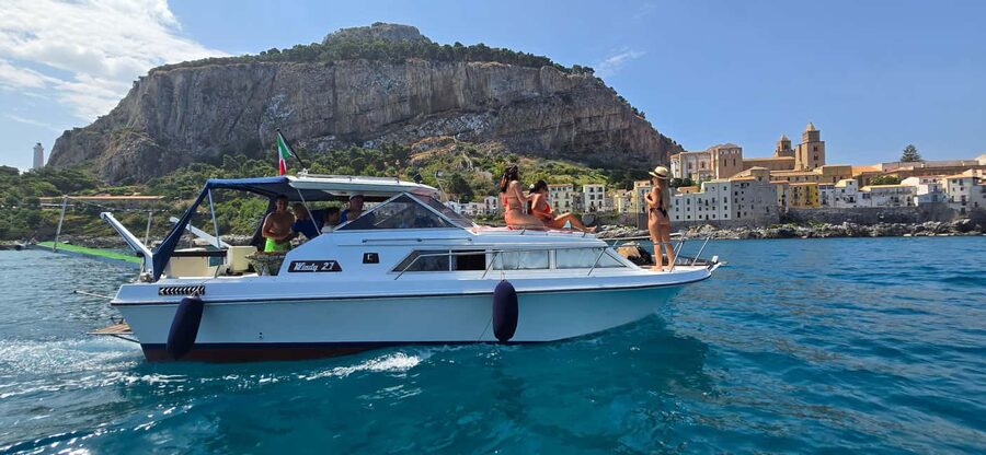 Cefalù: Coast-to-coast boat day trip with snorkeling and aperitif - Cefalù Beach: the main aperitif stop