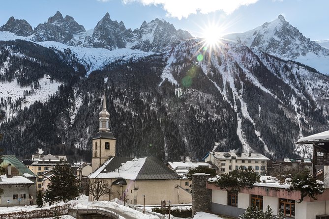 Chamonix & Mont Blanc Panoramic Sky-Glass Bus Guided Day Trip - Chamonix town, statues, and free time