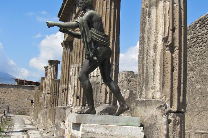 Explore Pompeii Half Day Highlights Tour with Pickup from Naples - Entering Pompeii with a guide and headset
