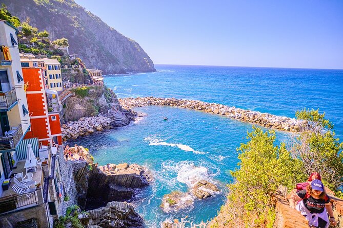 Florence: Cinque Terre Park Day Trip with Optional Street Food - Manarola: bright homes and a quick first look