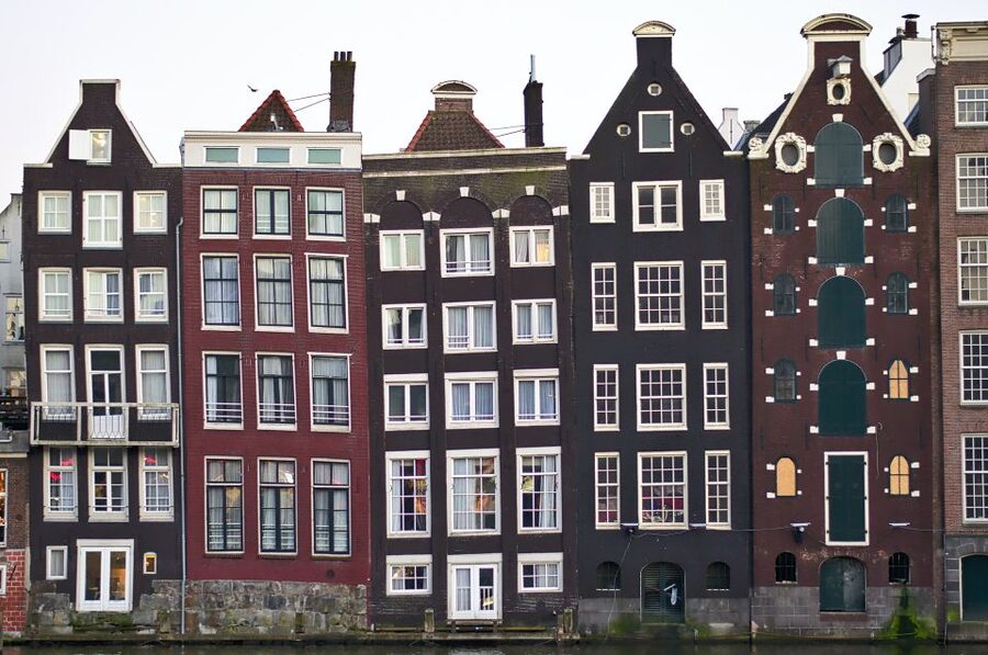 From Brussels: Cheese, Clogs & Windmills Amsterdam Day Trip - Amsterdam begins with a panoramic coach tour
