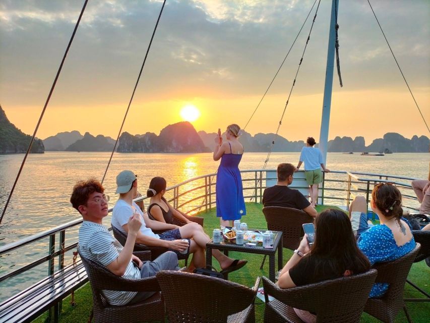 From Hanoi: Halong Bay Deluxe Cruise Day Trip - Sunset sailing and the ride back to Hanoi