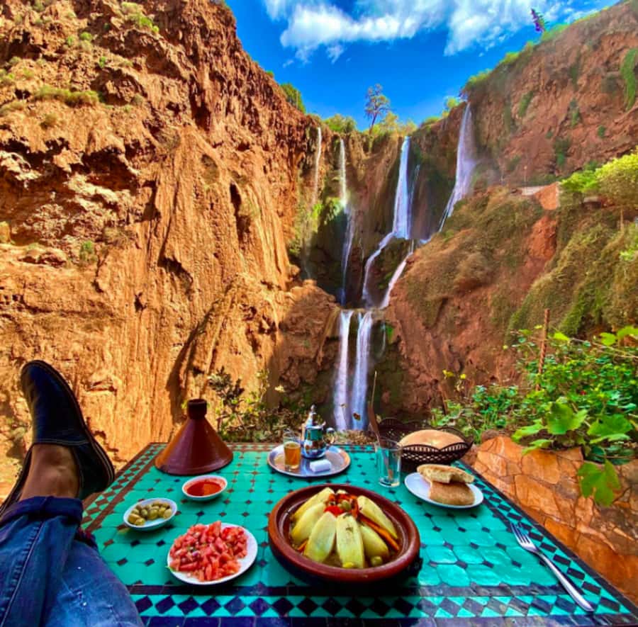 From Marrakech:Ouzoud Waterfalls Day Trip with Boat Tour - Arriving among red cliffs and olive groves