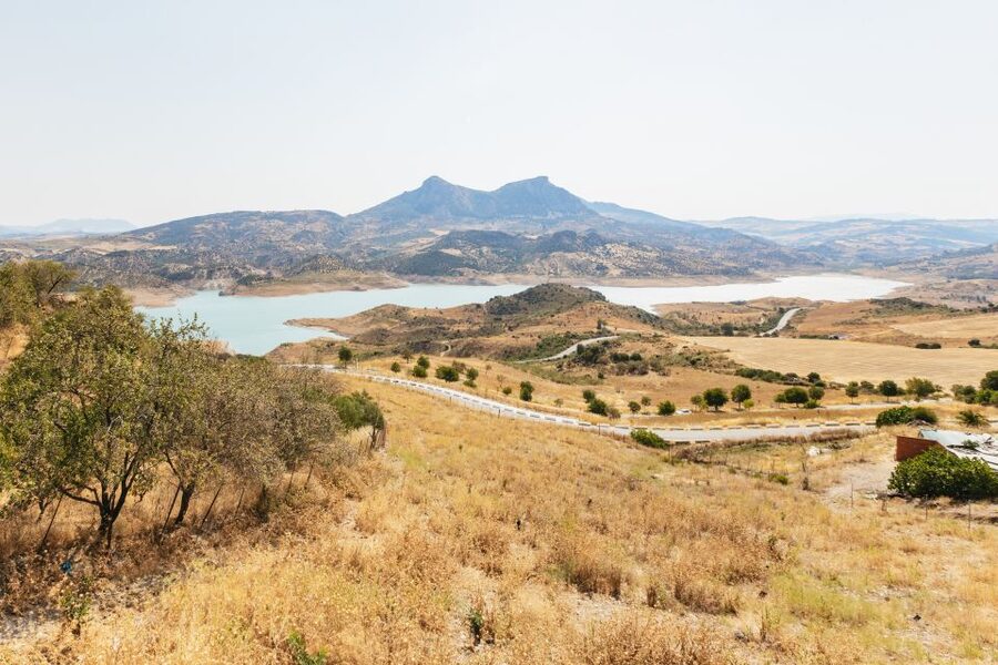 From Seville: Pueblos Blancos and Ronda Full-Day Trip - Zahara de la Sierra and its hillside setting