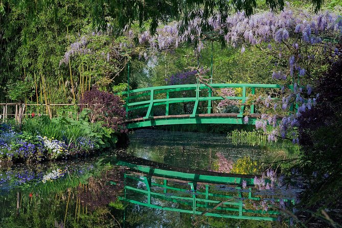 Giverny Monet's House & Versailles Palace Private Day Trip from Paris - Leaving Paris in a private minibus