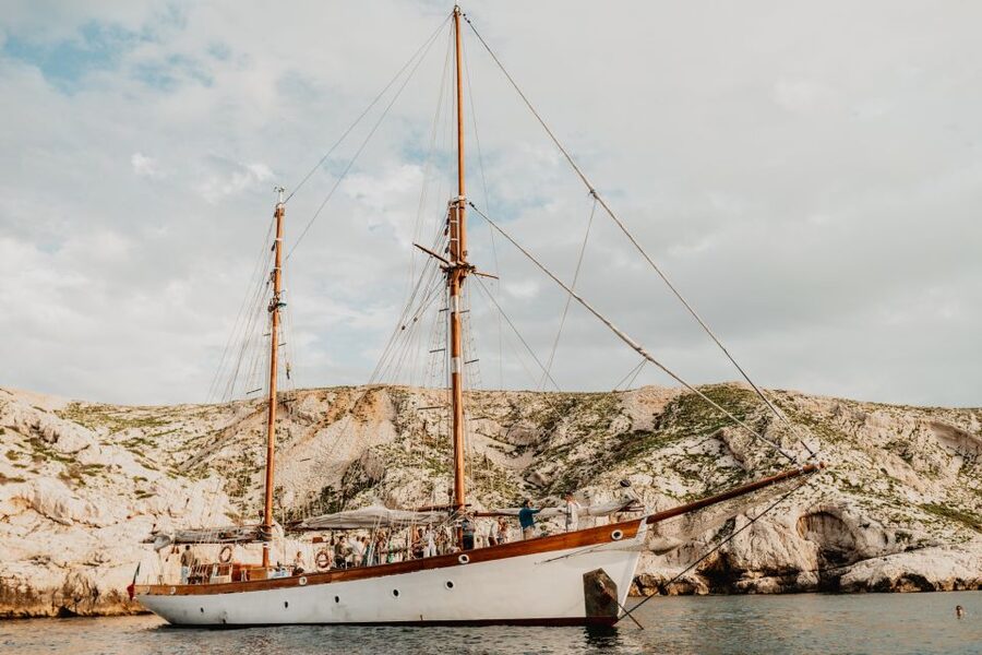 Marseille: Calanques Sailing Day Trip with Lunch and Wine - Shade, seating, and the practical comfort of the boat