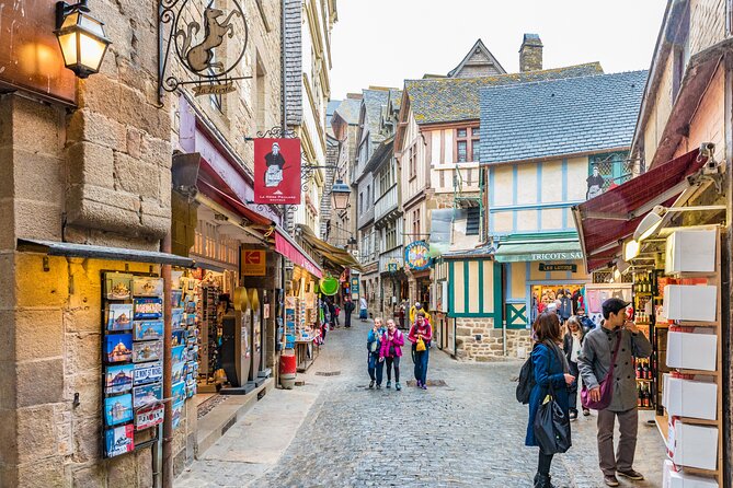 Mont Saint Michel Day Trip from Paris with English Speaking Guide - The shuttle from the parking area