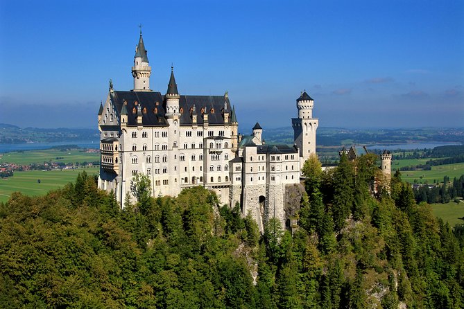 Neuschwanstein Castle and Linderhof Palace Day Trip from Munich - Oberammergau adds a quick Bavarian pause