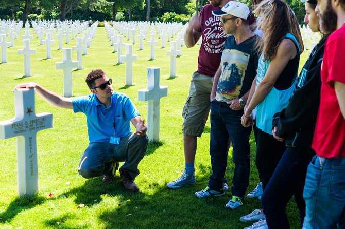 Normandy D-Day Small-Group Day Trip with Omaha Beach, Cemetery & Cider Tasting - Pointe du Hoc shows the scale of the climb