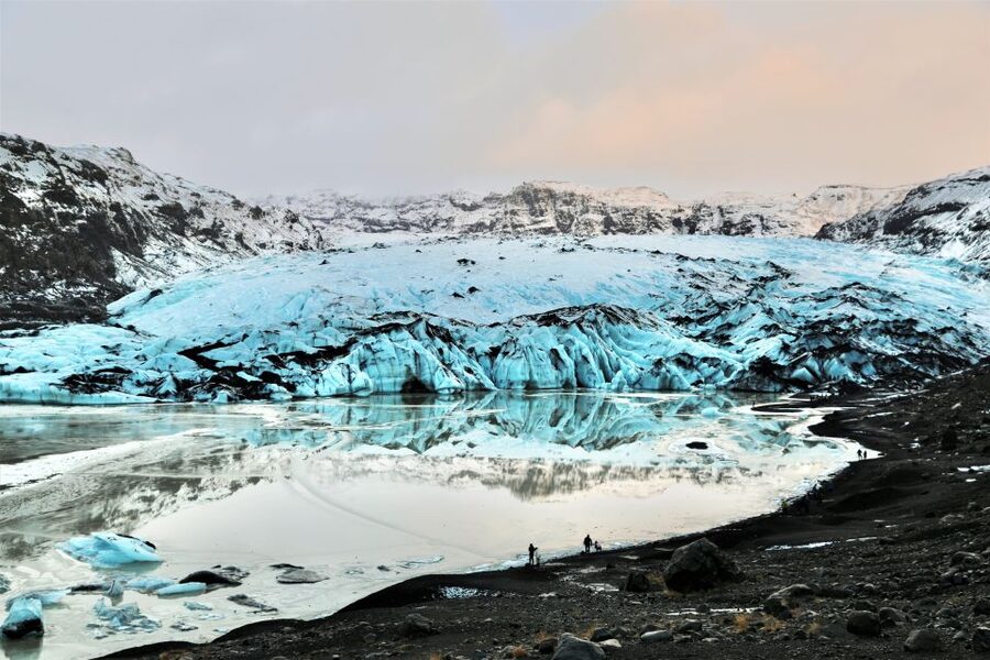 Reykjavík: South Coast Waterfalls, Black Sand & Glacier Tour - Sólheimajökull brings the glacier close
