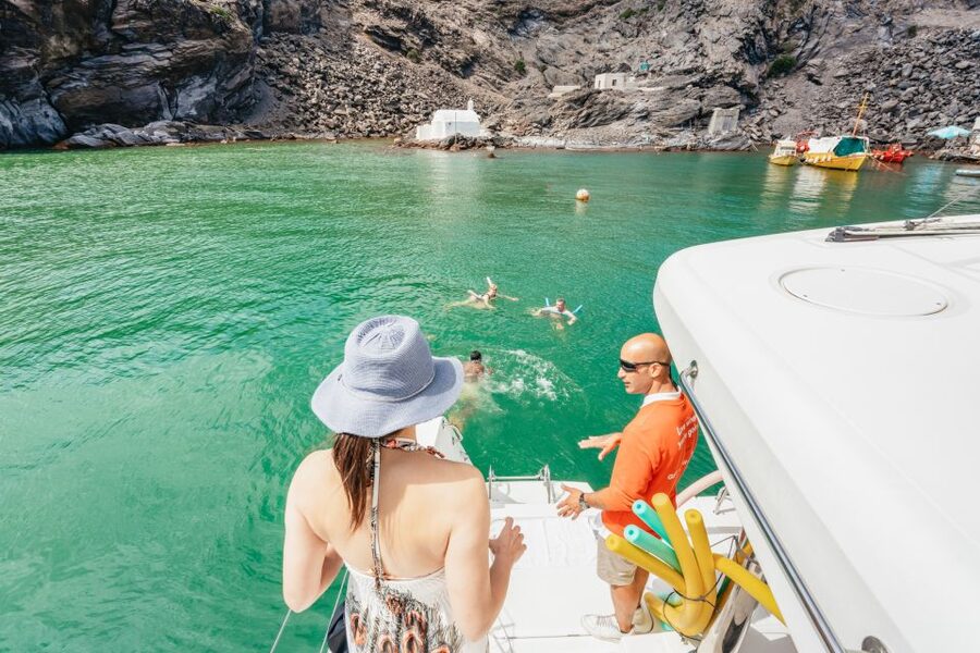 Santorini: Luxury Catamaran Day Trip with Meal and Open Bar - Who should book this Santorini cruise?