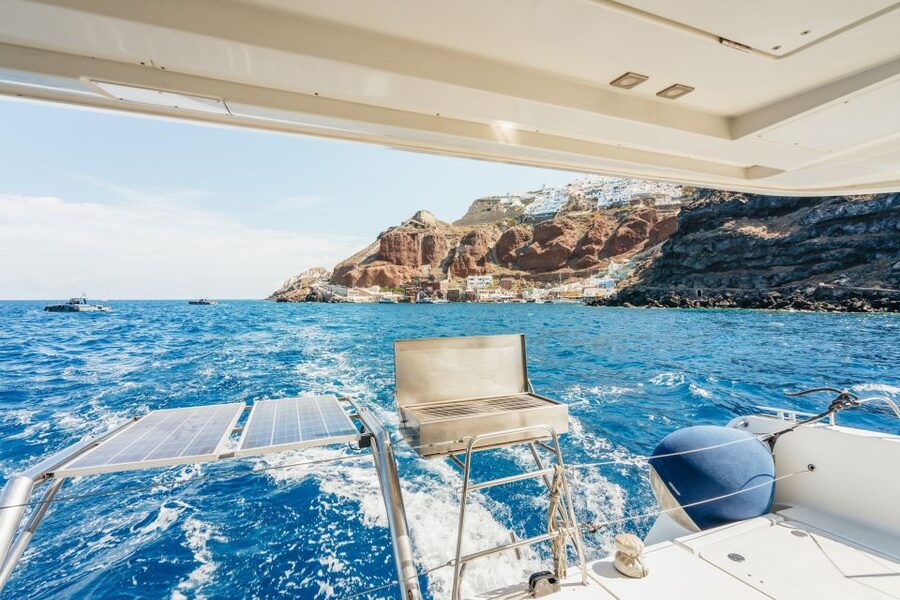 Santorini: Luxury Catamaran Day Trip with Meal and Open Bar - The hot springs are warm, not hot