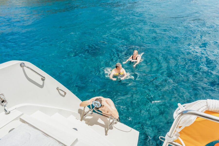 Santorini: Luxury Catamaran Day Trip with Meal and Open Bar - How much value do you get for $129?