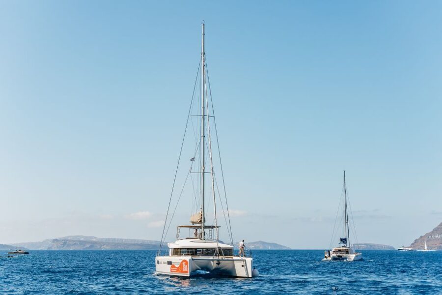 Santorini: Luxury Catamaran Day Trip with Meal and Open Bar - Choosing morning or sunset