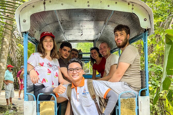 Small-Group Mekong Delta Day Trip: Boat Ride, Cottages & Pagoda - Garden Paths, Village Bicycles, and Canal Cottages