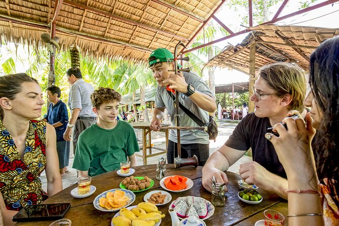 Small-Group Mekong Delta Day Trip: Boat Ride, Cottages & Pagoda - Vinh Trang Pagoda Closes the Day