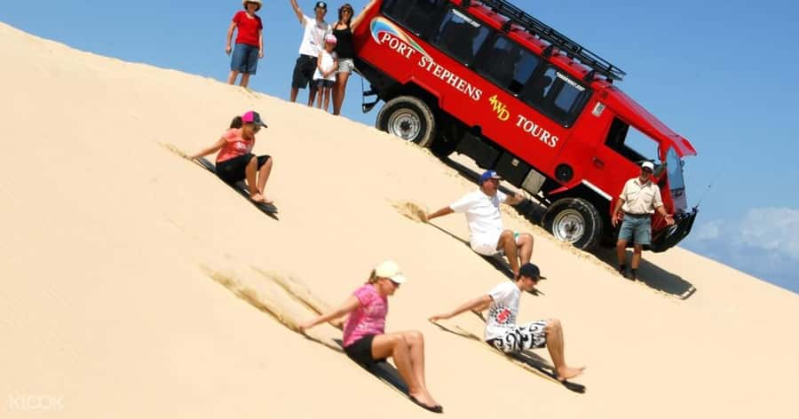 Sydney: Port Stephens Dolphin Cruise & Sandboarding Day Trip - What to pack for the boat and dunes